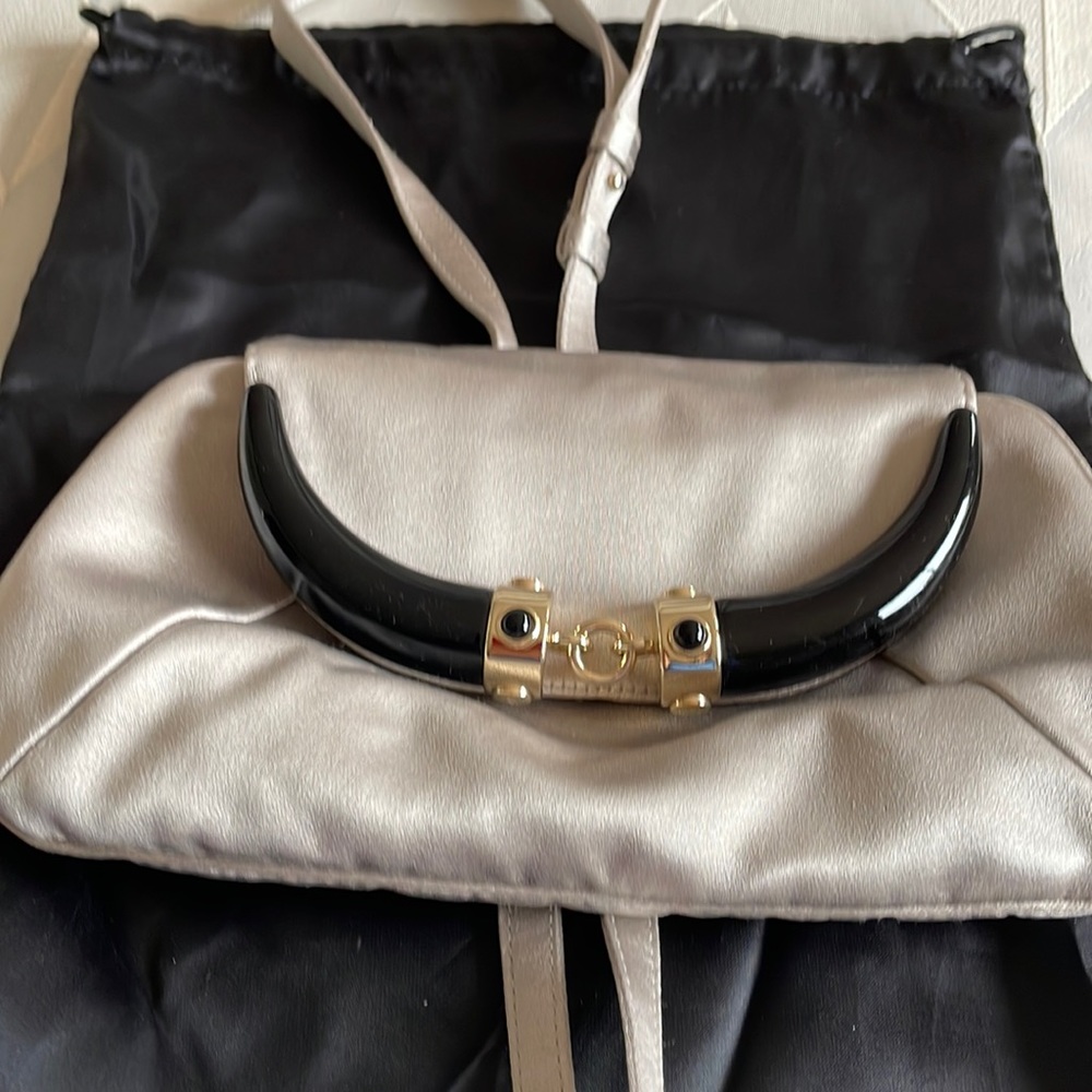 YSL evening clutch silver gray color. Silk with the black design on top